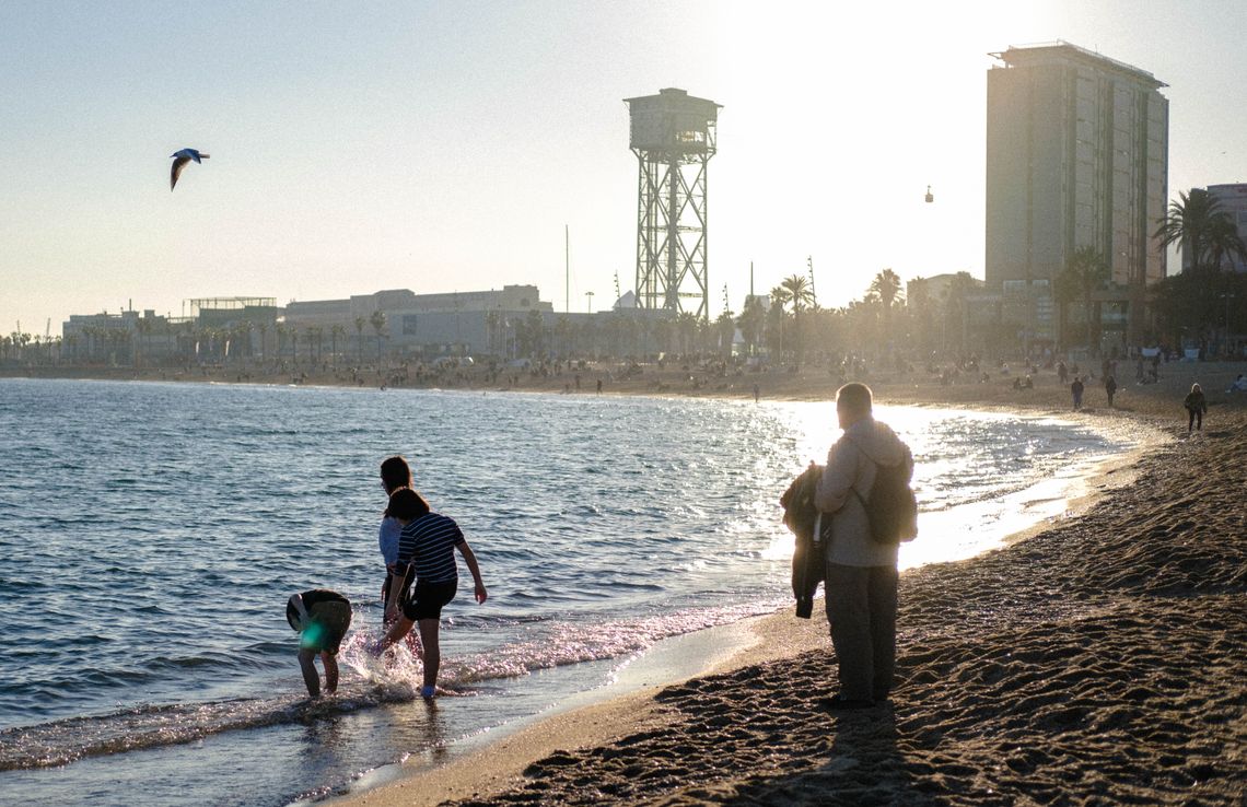 Kids playing on the beach in the Barceloneta